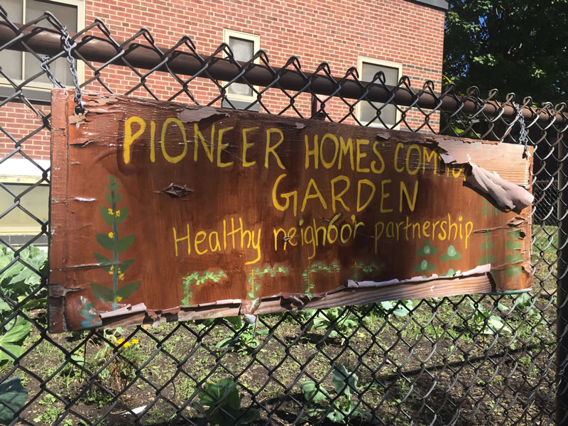 Pioneer Homes wooden sign